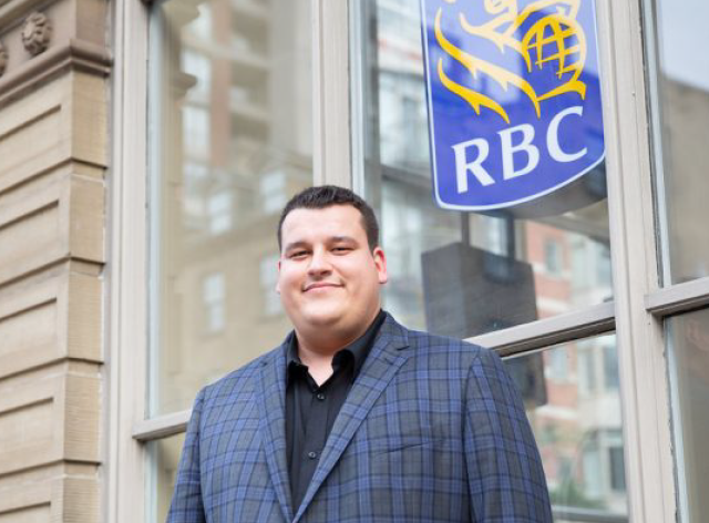 youth standing in front of RBC