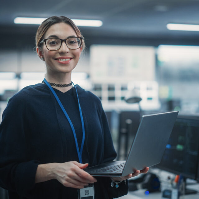 Girl holding a laptop