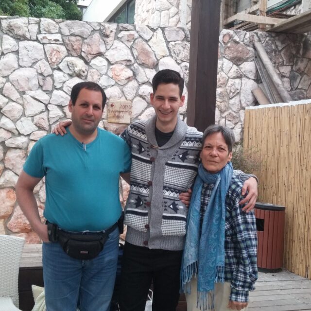 Tom (middle) with his biological Uncle Shai and Grandma Shlomi