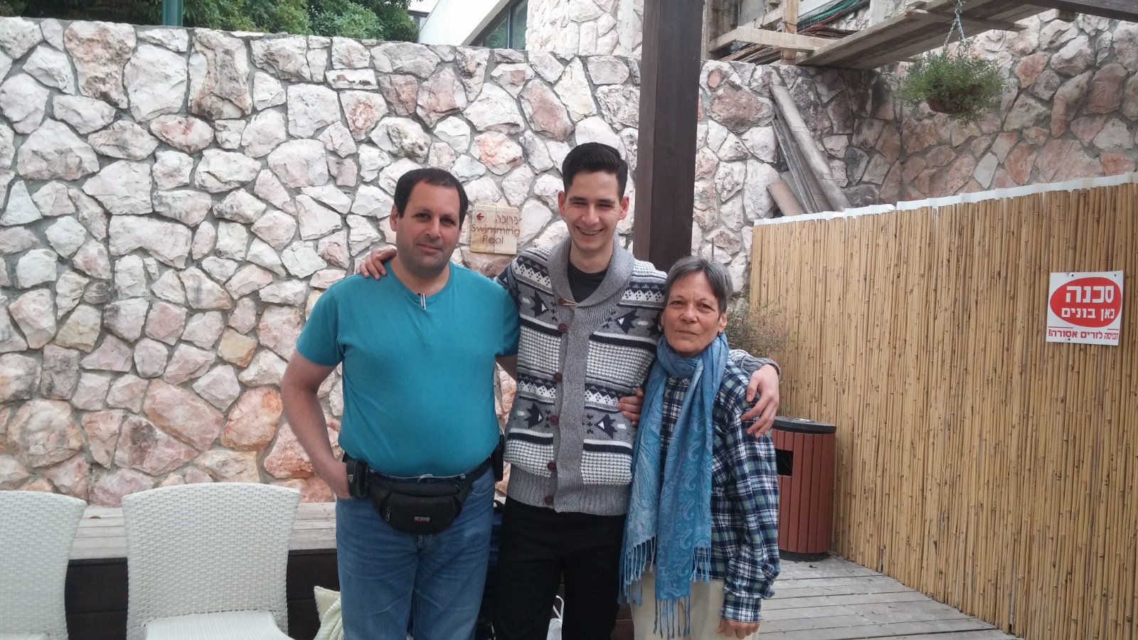 Tom (middle) with his biological Uncle Shai and Grandma Shlomi