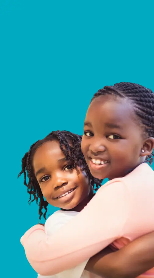 Two girls hugging